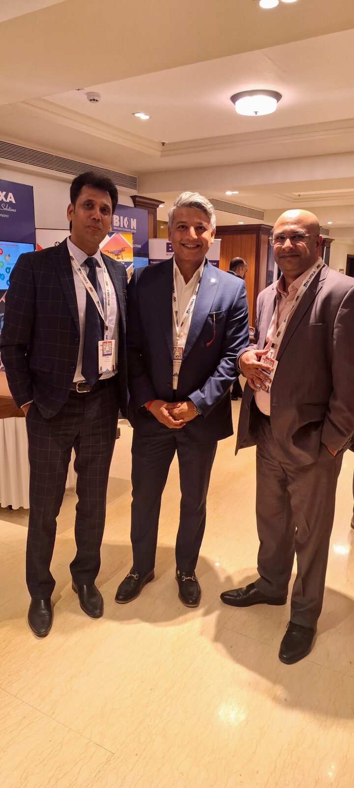 Capt. Prabhu with two industry colleagues at a security industry event.